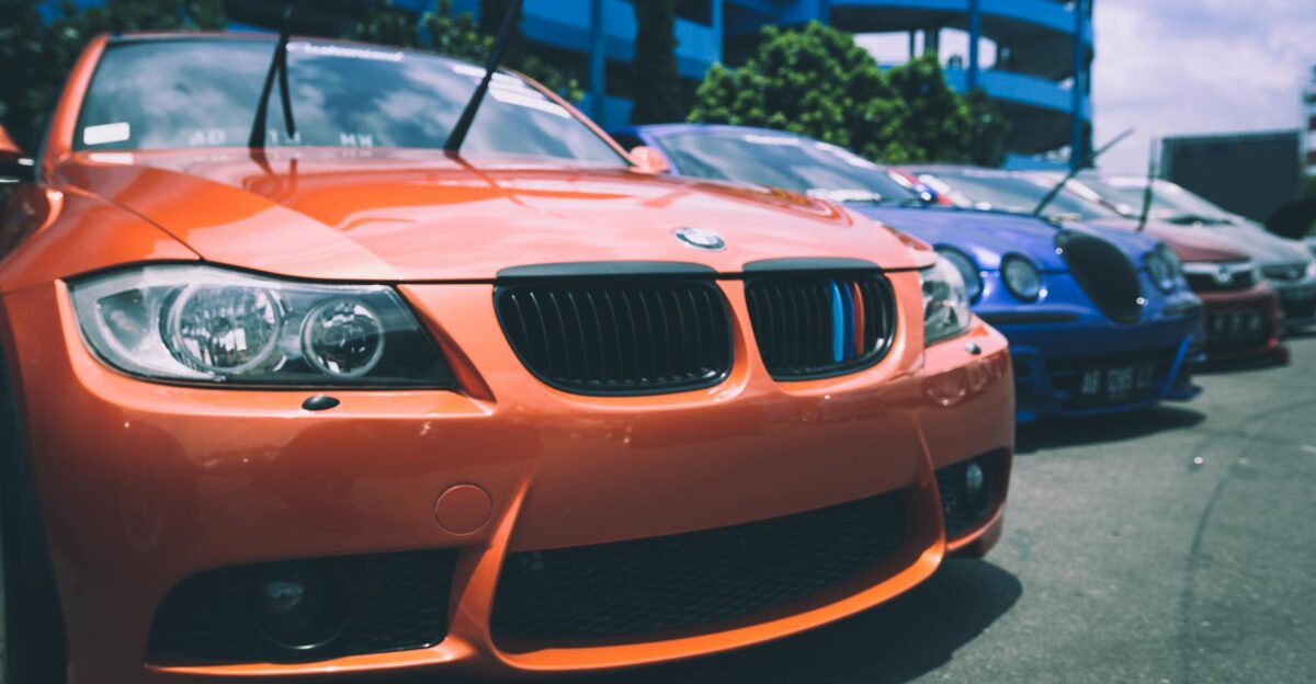 Vibrant BMW cars parked outdoors showcasing an array of colors and designs