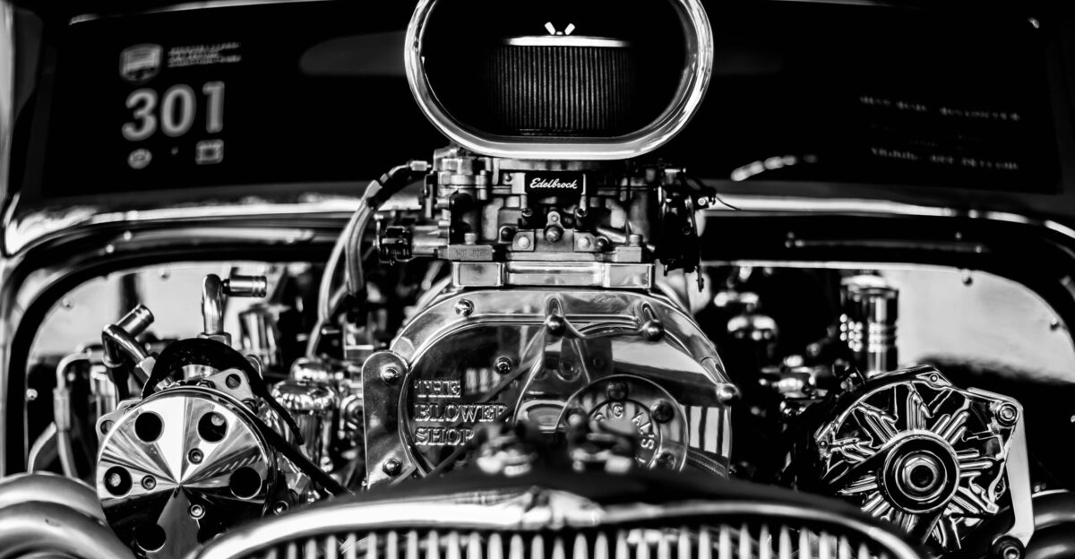 grayscale photography of vintage car engine
