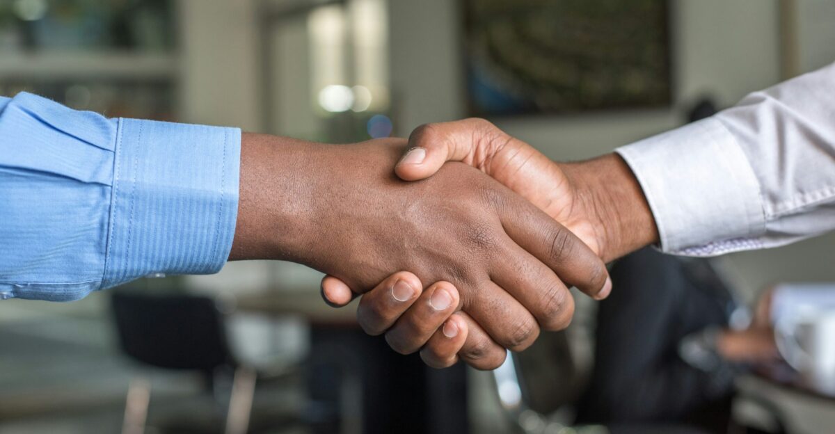 two people shaking hands