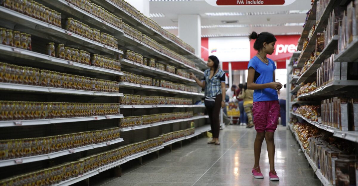 People walk past shelves mostly filled with the same product at a