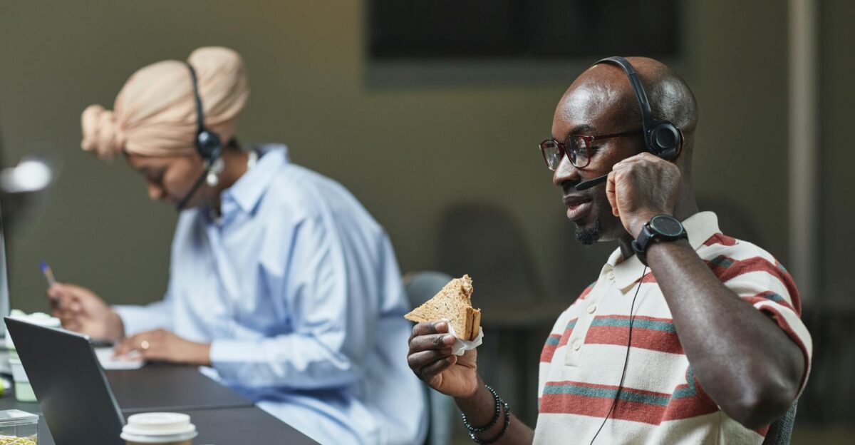 Diverse employees engaging in call center tasks balancing work and breaktime