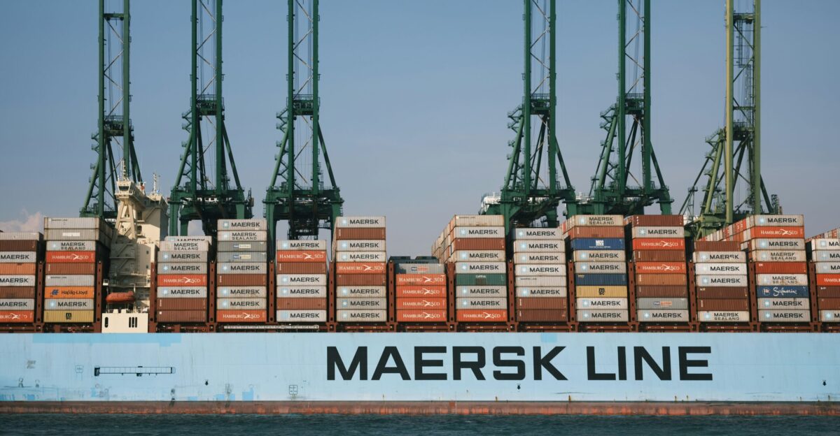 cargo ship on body of water during daytime