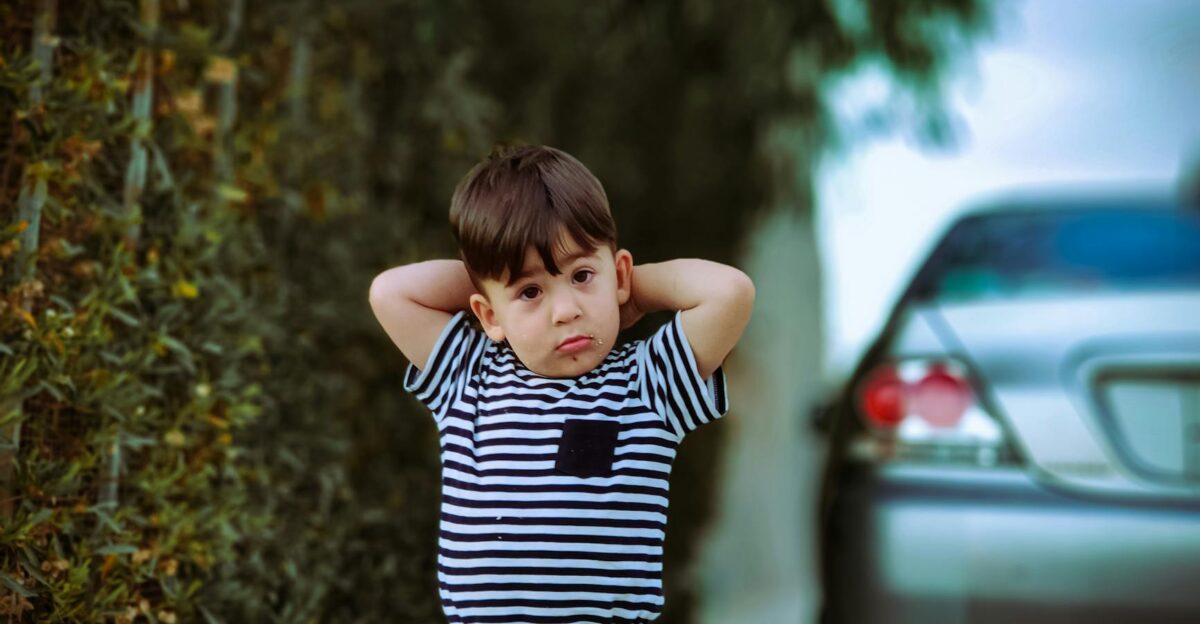 Charming portrait of a young boy posing casually outdoors in Iraq Vibrant and playful shot