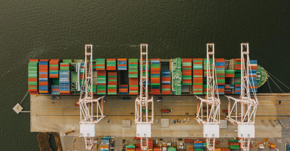 Overhead shot of colorful cargo containers and cranes at Baltimore s bustling port