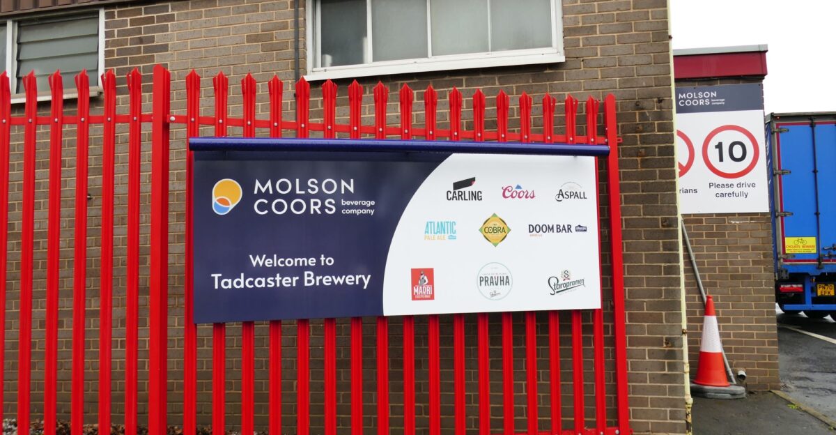 Sign at the entrance to Molson Coors brewery Tadcaster