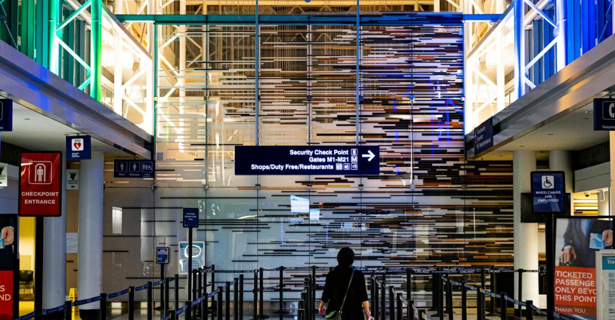 A traveler enters the security checkpoint at O Hare Airport terminal Chicago