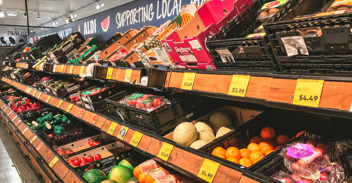 assorted fruits on brown wooden shelf