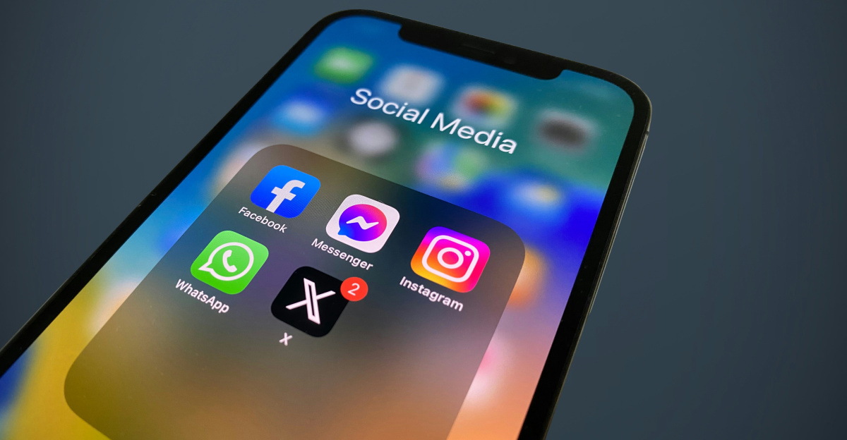 a close up of a cell phone with social media icons