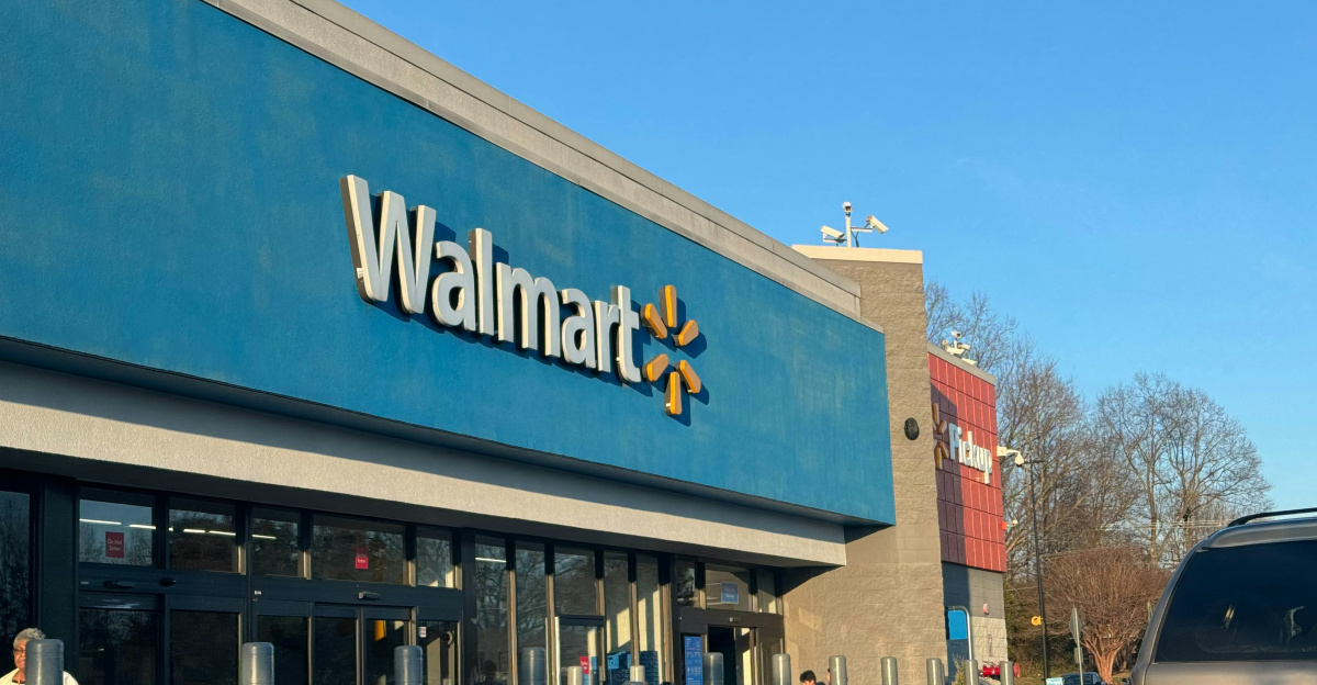 a walmart store with a car parked in front of it