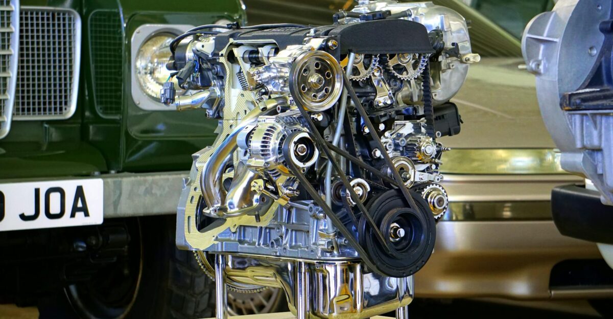 Detailed view of a polished car engine in an exhibition setting